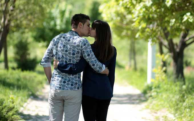 Attractive couple kissing